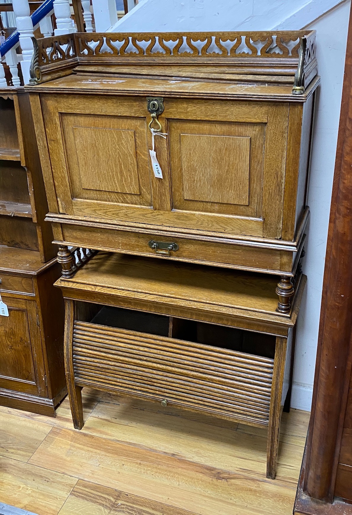 An early 20th century Continental oak writing cabinet, width 70cm, depth 24cm, height 122cm